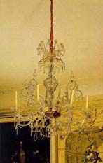 The dining room with the Parchen-styled glass chandelier from the late 18th century. The chateau of Veltrusy.